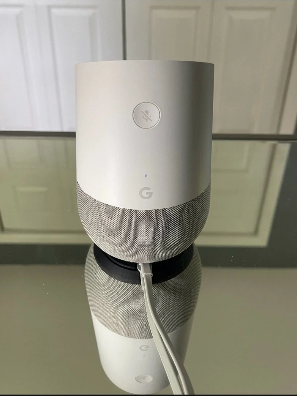 google Home Smart Speaker in White and Light Gray